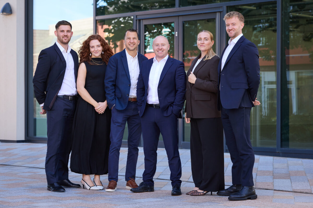 The HURST Corporate Finance team stood in a line outside the Stockport Exchange office